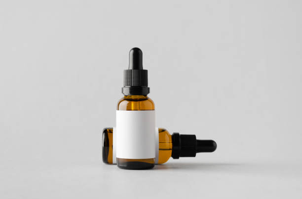 istock Dropper Bottle Mock-Up - Two Bottles. Blank Label 696978728