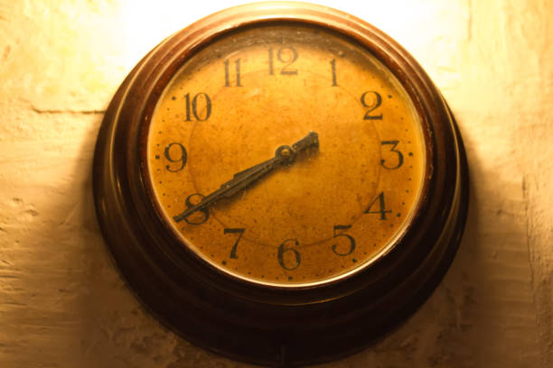 istock Antique Orange-ish Wall Clock: Twenty to Eight 696978882