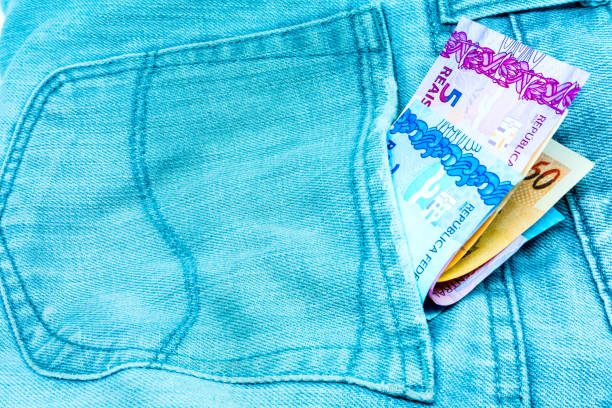 istock Brazilian money in jeans 696981290