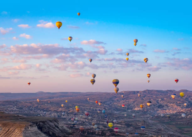 istock Many air balloons fly over Goreme valley. 696984778