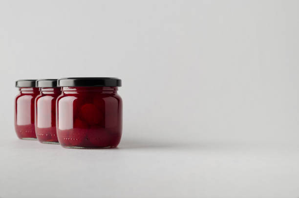 istock Strawberry Jam Jar Mock-Up - Three Jars 696999768