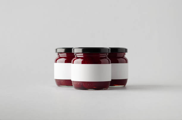 istock Strawberry Jam Jar Mock-Up - Three Jars. Blank Label 697000028