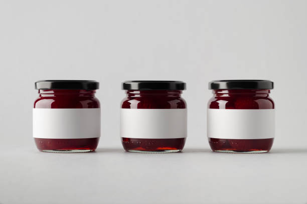 istock Strawberry Jam Jar Mock-Up - Three Jars. Blank Label 697000232