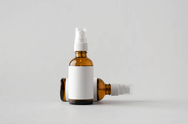 istock Amber Spray Bottle Mock-Up - Two Bottles. Blank Label 697008102