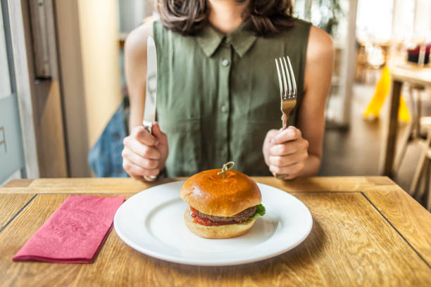 istock Woman and fast food 697008692