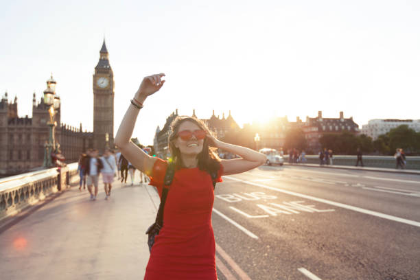 istock Woman having fun at sunset 697008704
