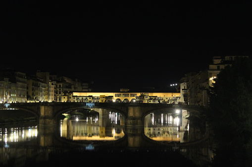Ponte Santa Trinita, Ponte Vecchio and Arno River at Night, Florence, Italy.