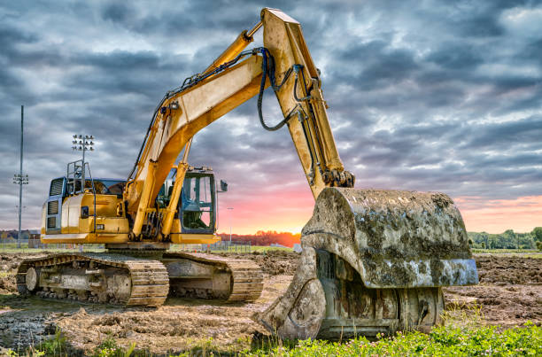 macchine per escavatori in cantiere - caterpillar truck foto e immagini stock