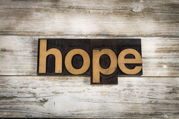 istock Hope Letterpress Word on Wooden Background 697021200