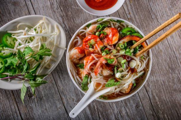 istock Pho, Vietnamese Soup Bowl, with seafood 697026878