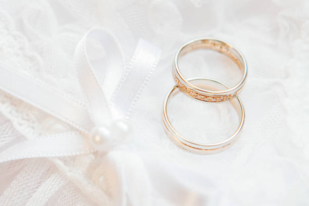 istock gold wedding rings on a white background 697026936