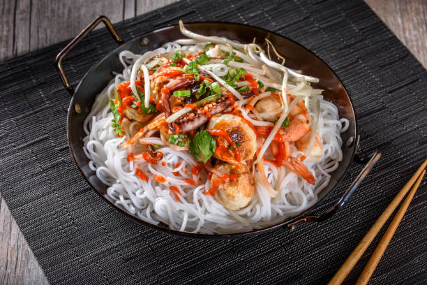 istock Delicious Asian Noodle with Bean Sprout , Mussel and Vegetables 697027192
