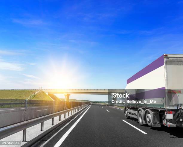 Truck On The Highway Stock Photo - Download Image Now - Asphalt, Autobahn, Business Finance and Industry