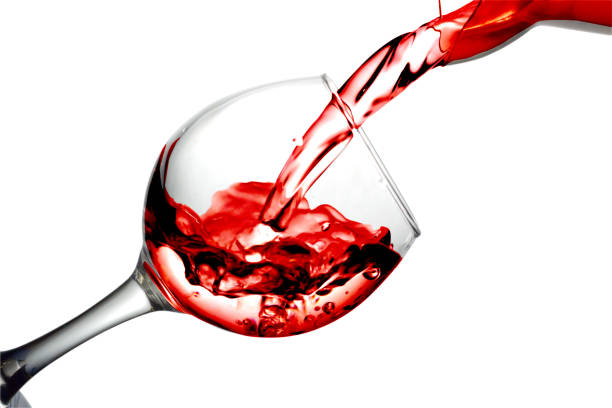 istock Desert fruit white wine is poured into a glass 697034588
