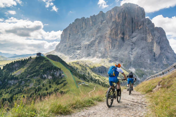 istock Scenic Langkofel Dowhillbiking, Dolomites, Italy 697038490
