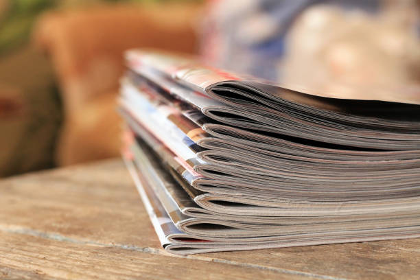 istock Magazines on the wooden table 697045014