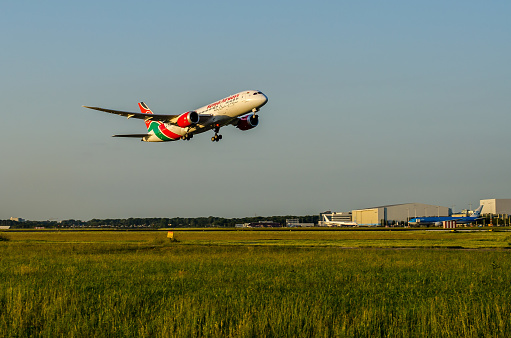 Boeing 787 Dreamliner of Kenya Airways taking off at Schiphol Airport, The Netherlands.