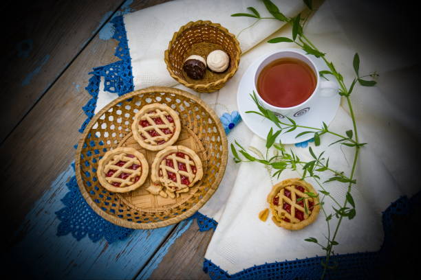 istock Still life with cup of tea and cake 697051364