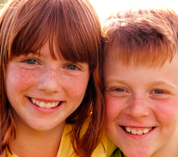 istock Happy kids playing outdoors 697060360