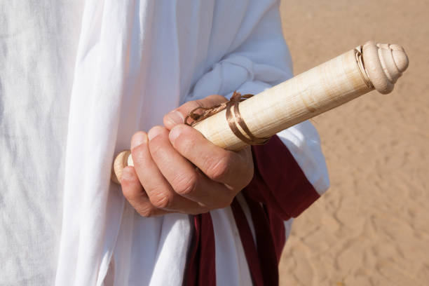 istock Ancient Roman book in hand 697068254