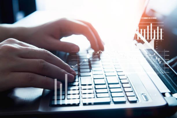 istock Male hands on a laptop keyboard 697068272