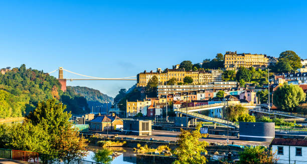 Clifton village with suspension bridge Clifton village and suspension bridge in Bristol at sunrise clifton stock pictures, royalty-free photos & images
