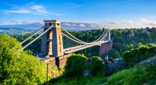 istock Bristol suspension bridge at sunset with climbers 697083644