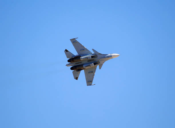 istock Bottom view of fighter in flight 697104222