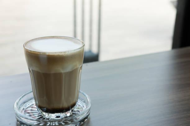 istock espresso macchiato coffee, hot mocha drink in glass 697122842
