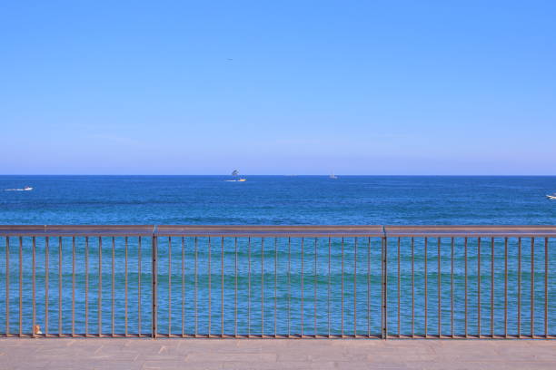 istock View of Barcelona sea at walk side 697143792