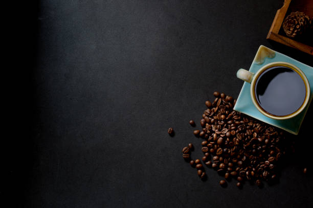 istock Top view with copy space of Coffee and beans on kitchen table. 697149040