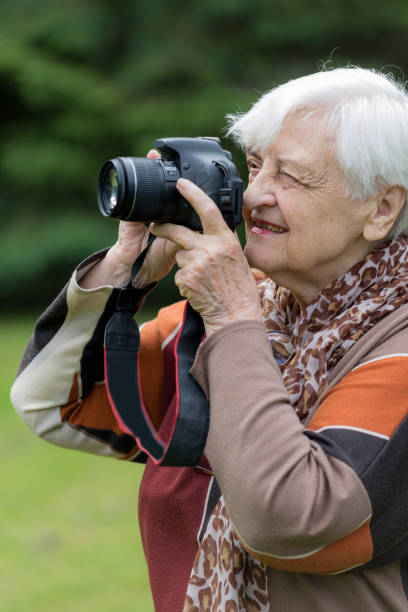 istock Senior women having fun with technology 697159474