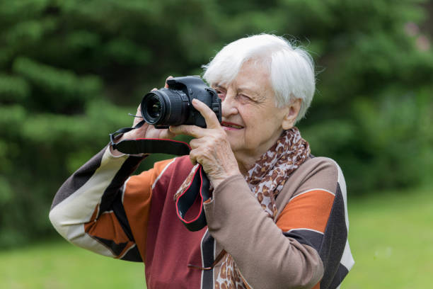 istock Senior women having fun with technology 697159786