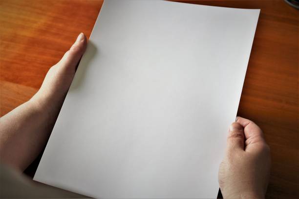 istock A image of a hand, or hands with paper 697173068