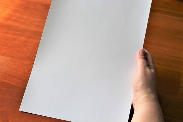 istock A image of a hand, or hands with paper 697173074