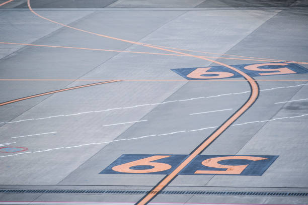 istock Numerals drawn on the runway at the airport. 697180478