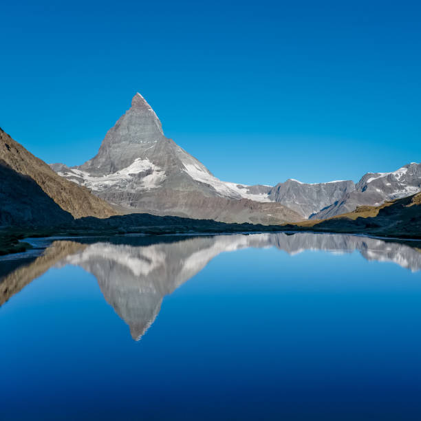 istock Matterhorn reflected in Lake  Riffelsee 697180766