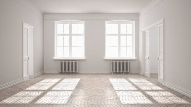 istock Empty room with parquet floor, big windows, doors and radiators, white interior design 697190220