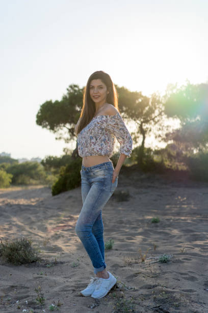 istock Beautiful girl on sunset 697191302