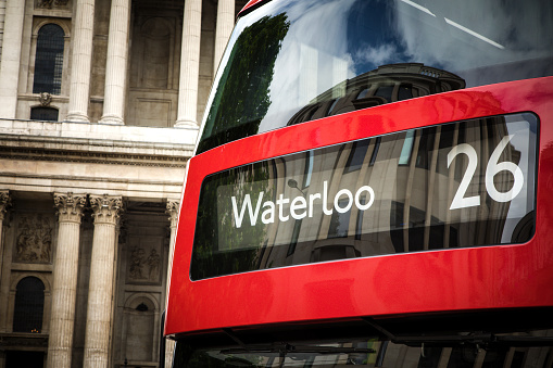 Detail of a red London bus on route to Waterloo.