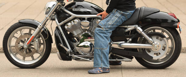 Sitting on a Harley Davidson stock photo