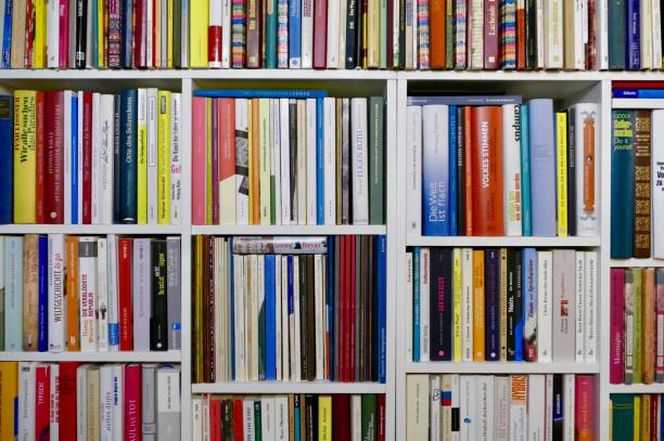 Bookshelf with many different books Interior view of bookshelf büro stock pictures, royalty-free photos & images
