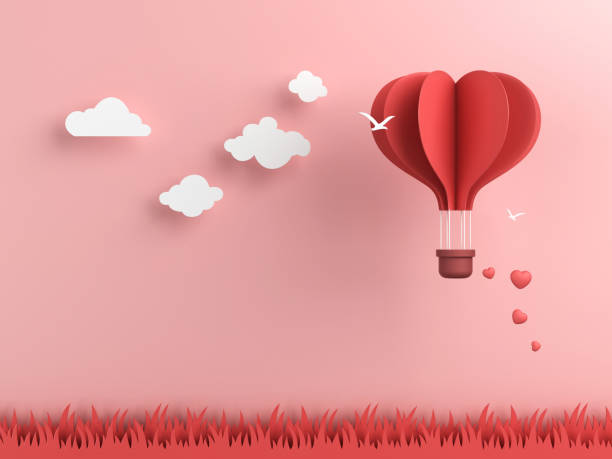 Origami made hot air balloon and cloud Origami made hot air balloon and cloud honeymoon book stock pictures, royalty-free photos & images