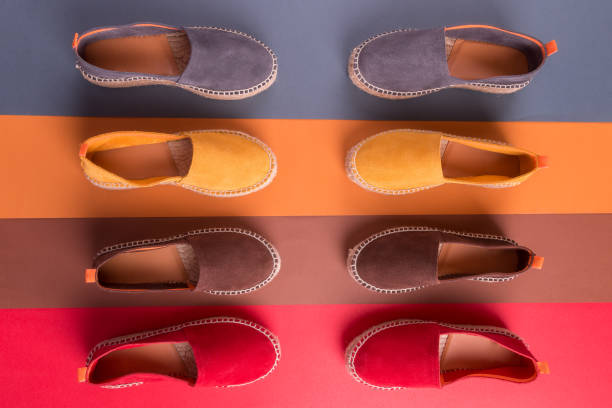 istock Loafers on multicolor background. Top view. Four pair. 697217888