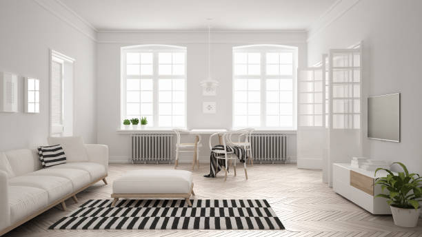istock Bright minimalist living room with sofa and dining table, scandinavian white interior design 697222160