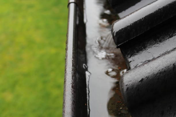 istock An image of a drain with raindrops 697225642