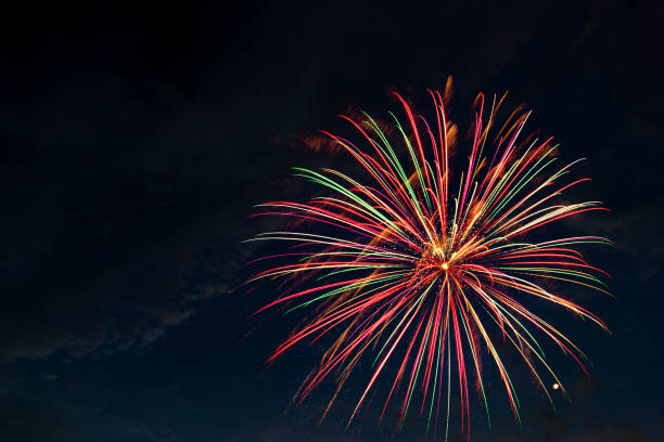 istock Brightly colorful fireworks and salute 697231724