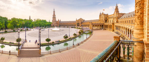 The Square of Spain Spain Square (Plaza de Espana), Seville, Spain, built in 1928, it is one example of the Regionalism Architecture mixing Renaissance and Moorish styles. sevilla province stock pictures, royalty-free photos & images
