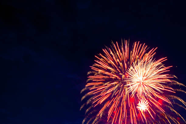 istock Beautiful colorful fireworks on sky. 697234716