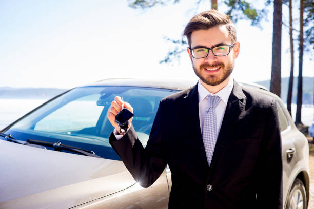 istock Man holding car keys 697235386